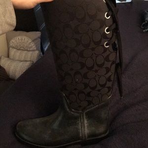 Woman coach rain boots